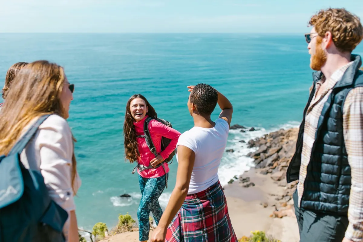 Extended family gathered and laughing together on a trip